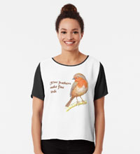 young woman wearing t-shirt with robin image and text